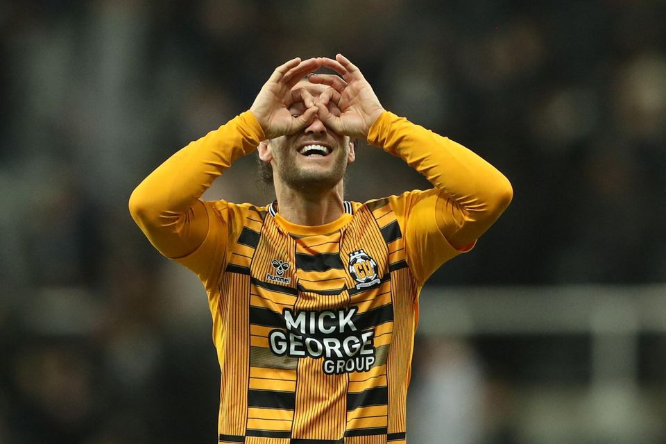 Wes Hoolahan celebrates Cambridge's shock win over Newcastle United in the FA Cup. Photo: Reuters