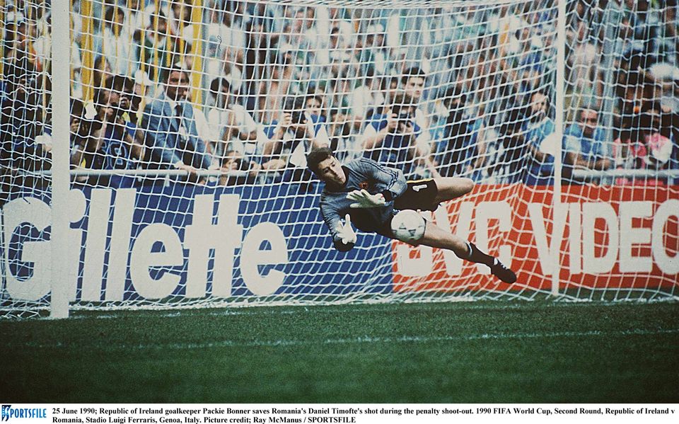 25 June 1990; Republic of Ireland goalkeeper Packie Bonner saves Romania's Daniel Timofte's shot during the penalty shoot-out. 1990 FIFA World Cup, Second Round, Republic of Ireland v Romania, Stadio Luigi Ferraris, Genoa, Italy. Picture credit; Ray McManus / SPORTSFILE