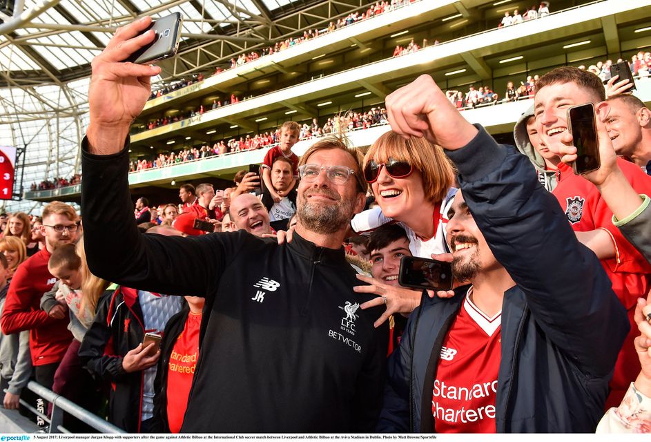 Liverpool manager Klopp with supporters after the game