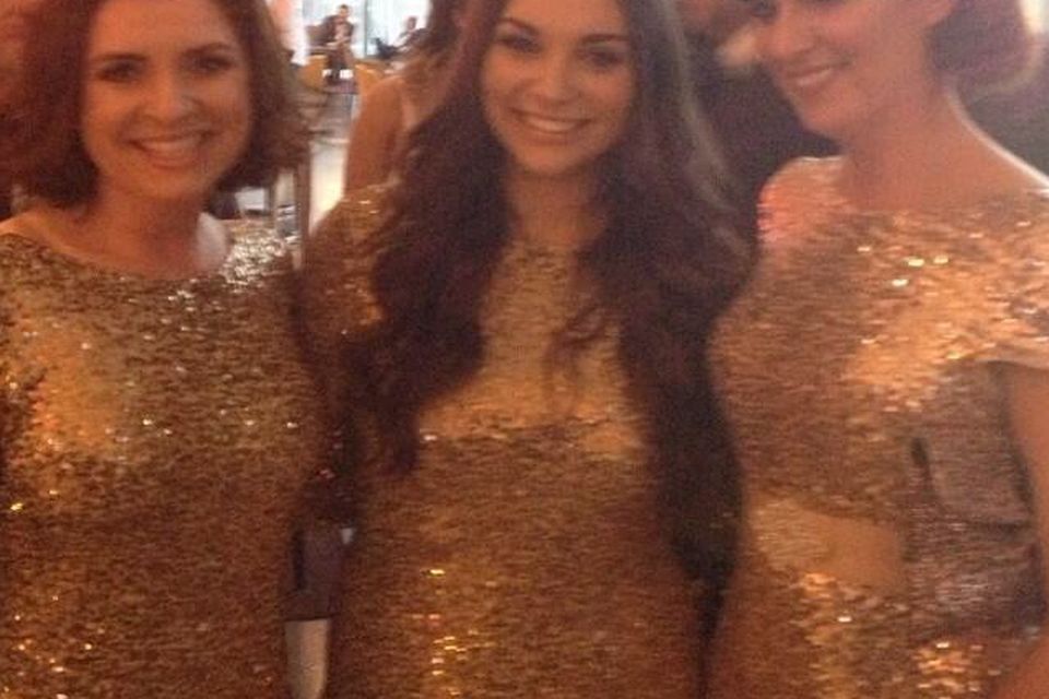What are the chances -- three of us turning up in the same gold dress? |  Irish Independent