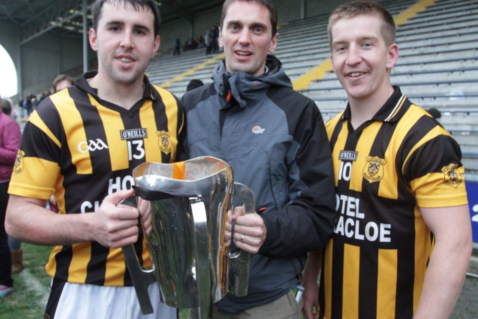 Shelmaliers captain Ciaran O'Shaughnessy and man of the match Joe Kelly with Cormac Pettitt of Pettitt's SuperValu who have sponsored the Senio hurling championship every year without a break since 1994