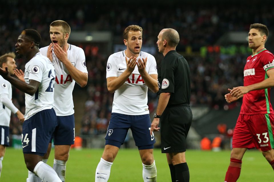 Referee Mike Dean was unmoved when Spurs called for a penalty