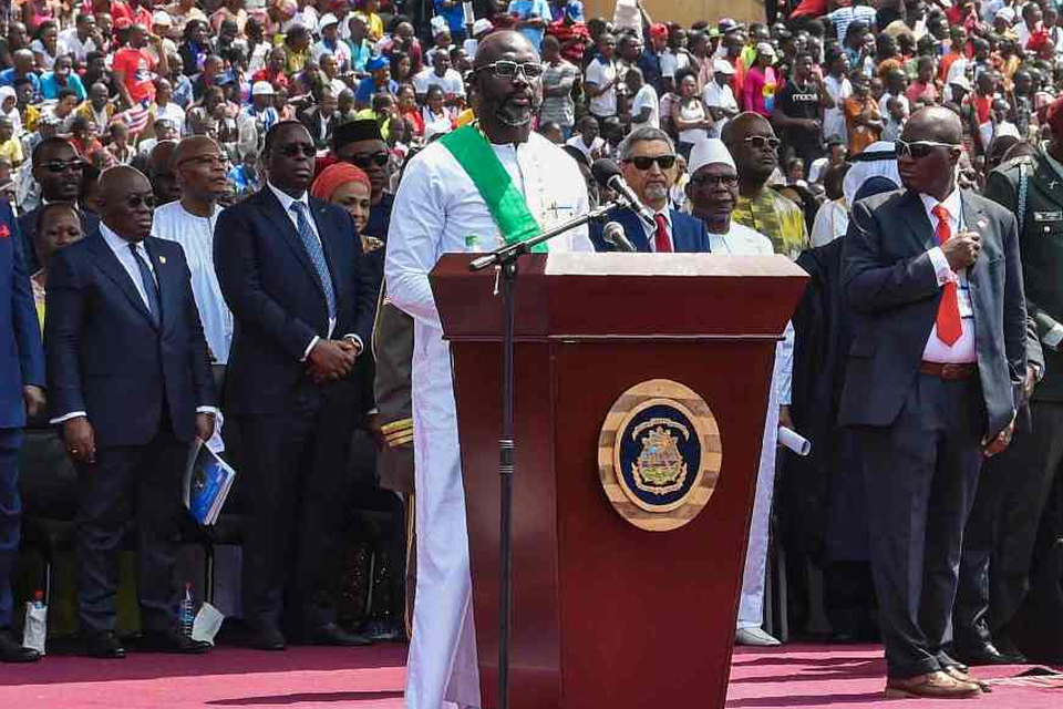 Liberia’s president-elect and former football star George Weah (C) delivers a speech during his swearing-in ceremony yesterday in Monrovia. Photo: Getty Images