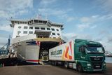 thumbnail: Haulage trucks arrive from Ireland at the Port of Cherbourg in France. Photo: Bloomberg