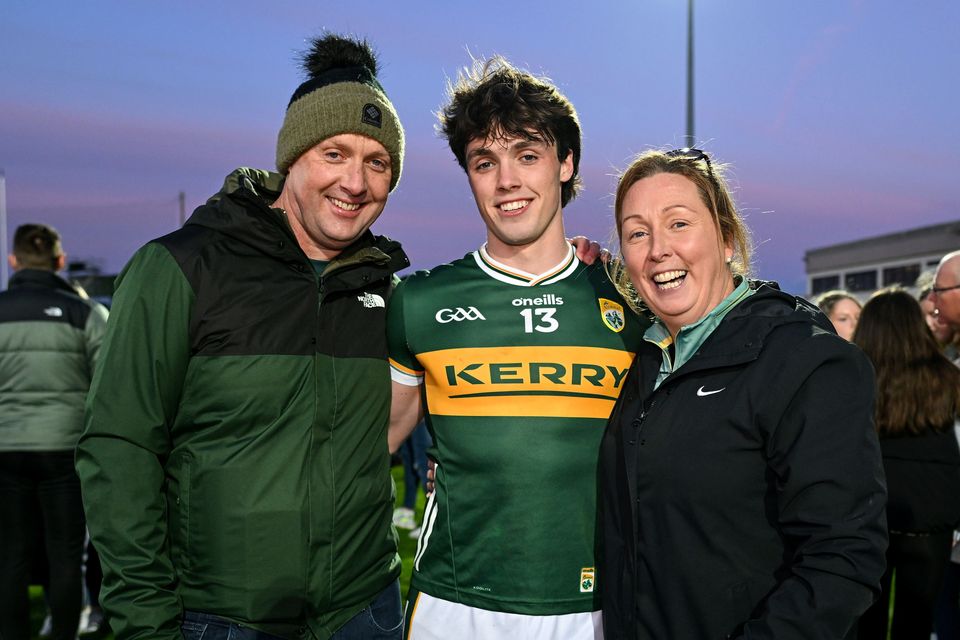 Luke Crowley of Kerry celebrates with his parents Marie and father John, former Kerry footballer, after the Munster U-20 Football Championship Final