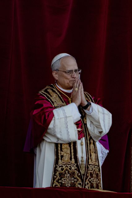 Newly elected Pope Leo XIV, formerly cardinal Robert Francis Prevost, appears on the central loggia of St Peter’s Basilica at the Vatican (Domenico Stinellis/AP)