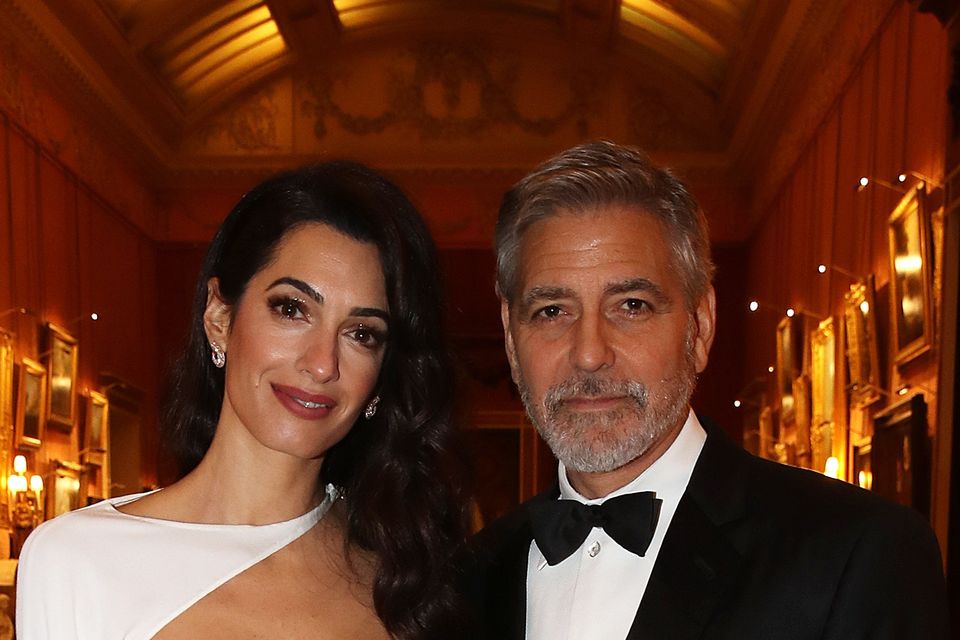 Amal Clooney stuns in white gown at Prince's Trust dinner at Buckingham  Palace | Irish Independent