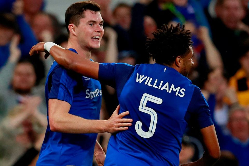 Everton's Michael Keane celebrates scoring against Split