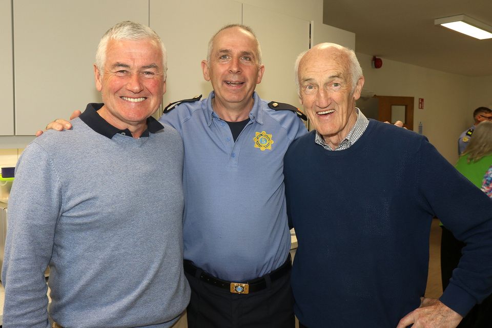 Gerry McGrath, Insp. Syl Hipwell and Tony Fagan at the coffee morning in aid of the Hope Centre in Enniscorthy Garda Station.