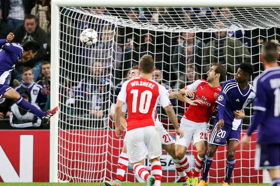 Anderlecht's Andy Najar heads to score against Arsenal during their Champions League Group D soccer match at Constant Vanden Stock stadium in Brussels