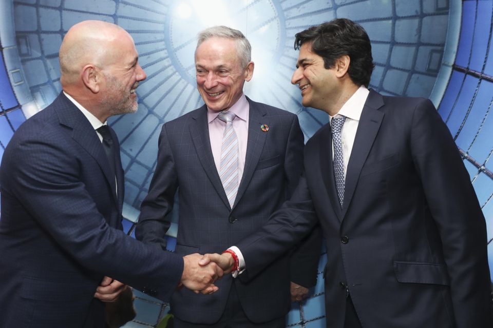 Green fingers: Energia CEO Ian Thom, left, with Minister Bruton and I Squared founder Gautam Bhandari