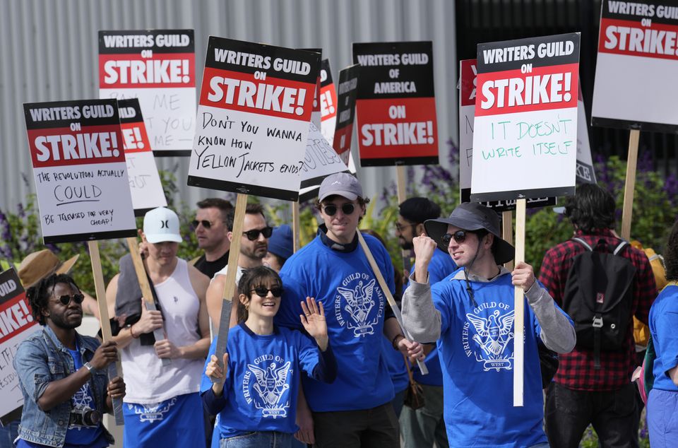 Striking writers rally in front of Netflix offices (Chris Pizzello/AP)