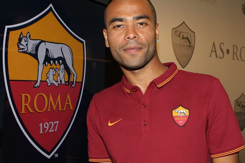 Ashley Cole poses for photographs as he is unveiled at his new club AS Roma. Photo: Paolo Bruno/Getty Images