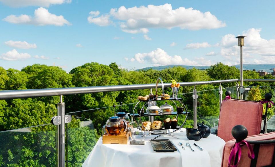 Afternoon tea on a balcony at The Fitzwilliam Hotel