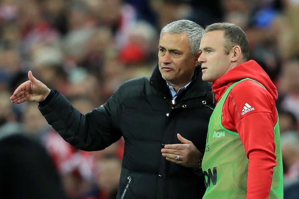 Jose Mourinho, left, understands why Wayne Rooney, right, chose to retire from international football