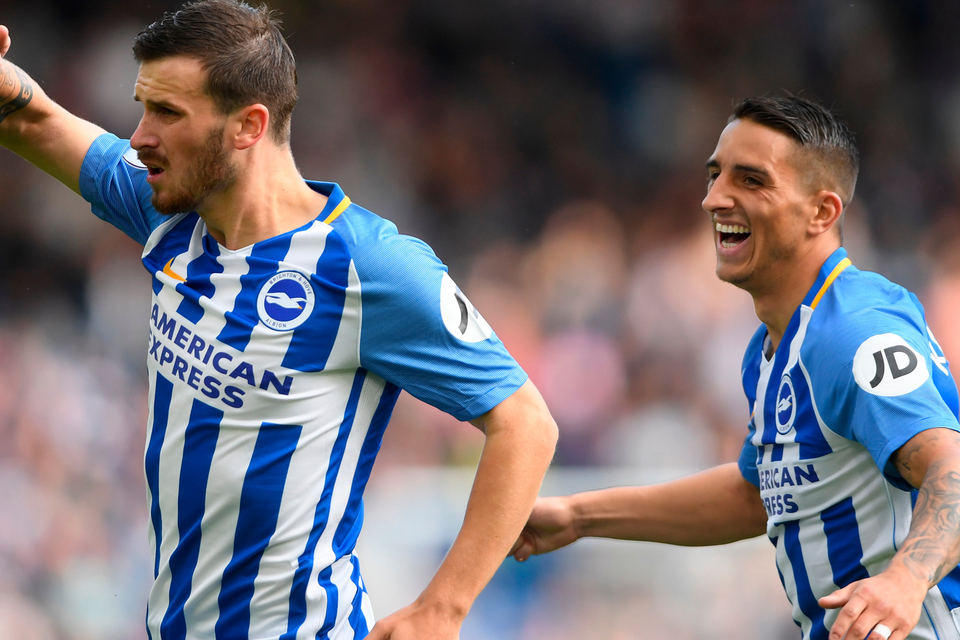 Pascal Gross of Brighton celebrates with Anthony Knockaert after scoring his second goal. Photo: Getty Images