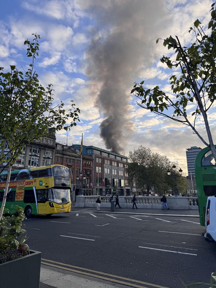 Emergency services attend fire in Dublin city centre; commuters warned of delays