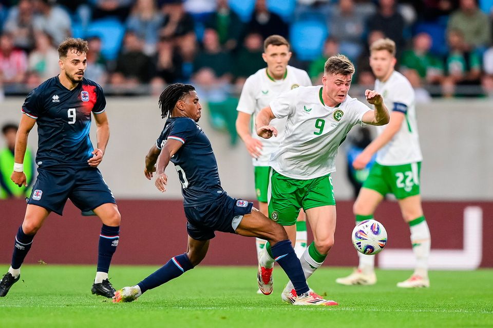 Ireland’s Evan Ferguson is tackled by Luxembourg’s Leandro Barreiro during last night’s  friendly at Stade de Luxembourg. Photo: Stephen McCarthy/Sportsfile