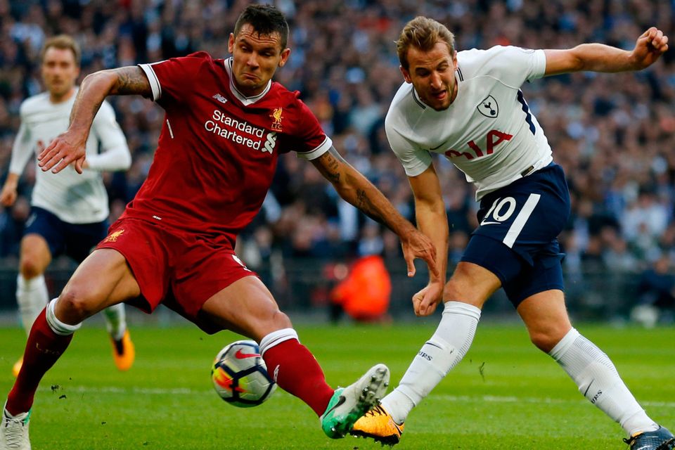 Liverpool’s Dejan Lovren struggles to contain Tottenham’s Harry Kane. Photo: AFP/Getty