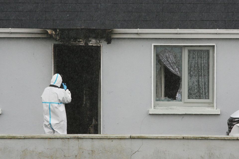 Investigators examine the house at which John Brogan was found dead at Pheasanthill, Castlebar, Co Mayo. Photo: Padraig O'Reilly