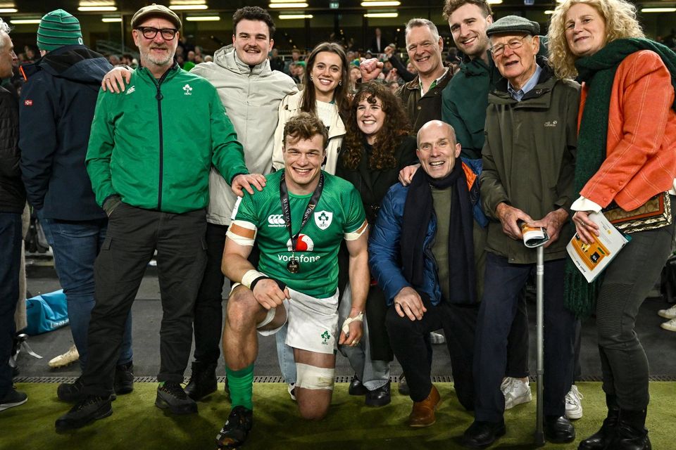 Josh van der Flier of Ireland with his family after his side's victory in the Guinness Six Nations Rugby Championship match between Ireland and England at Aviva Stadium in Dublin.
