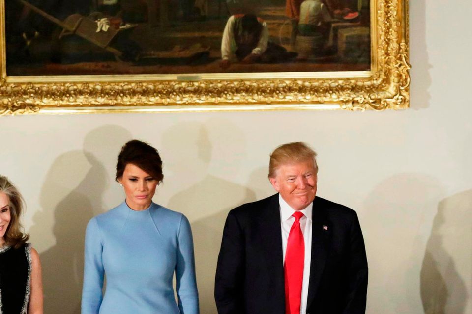 U.S. President Donald Trump and first lady Melania attend the Inaugural luncheon at the National Statuary Hall in Washington, U.S, January 20, 2017.  REUTERS/Yuri Gripas