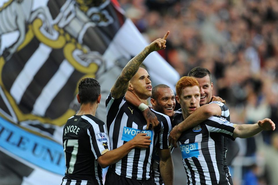 Gabriel Obertan celebrates his goal with his Newcastle United team mates during their Premier League win over Leicester City at St James' Park. Photo: Stu Forster/Getty Images