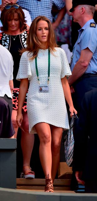 Kim Sears, wife of Britain's Andy Murray arrives at Centre Court to watch her husband play against Kazakhstan's Mikhail Kukushkin during their men's singles first round match on day two of the 2015 Wimbledon Championships