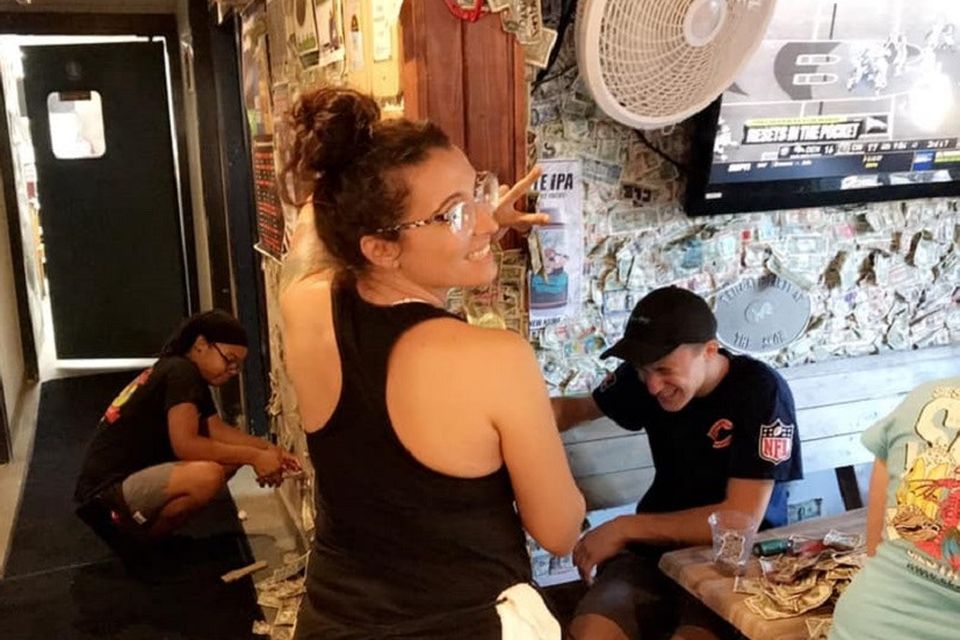 Siesta Key Oyster Bar staff pull notes from the wall (Siesta Key Oyster Bar)