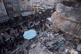 thumbnail: Palestinians shop at a local market next to a destroyed residential building by the Israeli airstrikes, during the Muslim holy month of Ramadan, in Rafah, Gaza Strip, Thursday, March 14, 2024. (AP Photo/Fatima Shbair)