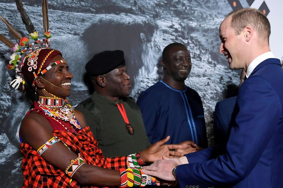 Award finalist Jeneria Lekilelei is congratulated by the Duke of Cambridge during the Tusk Conservation Awards at the Empire Cinema in Leicester Square, London. PA Photo/Toby Melville.