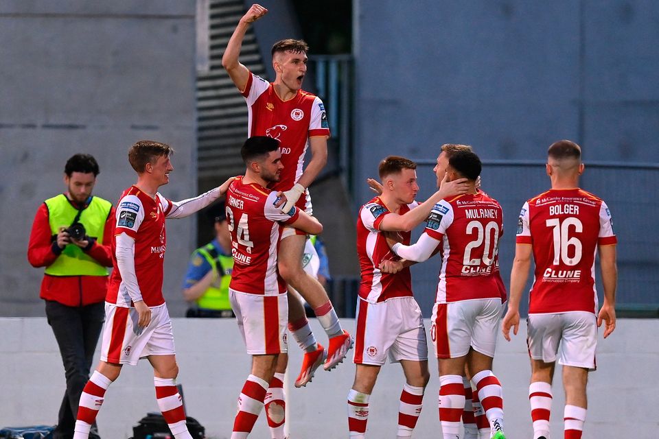 Mason Melia is lifted in celebration by his St Patrick's Athletic team-mate Luke Turner after scoring their side's second goal during the SSE Airtricity Premier Division match against Shamrock Rovers at Tallaght Stadium in Dublin. Photo: Stephen McCarthy/Sportsfile