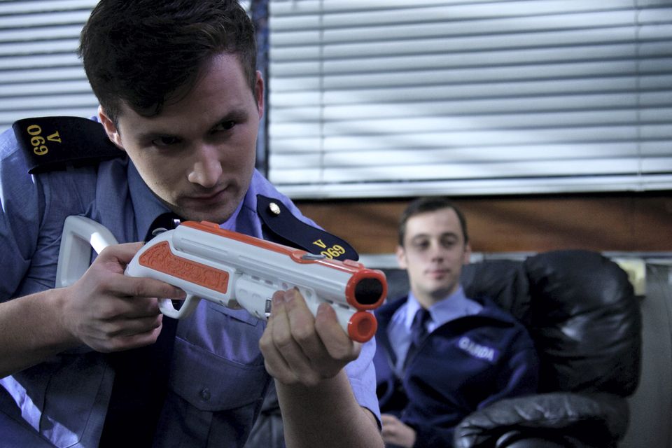 Dean Holden (David Crowley) fooling around at the Red Rock Garda  Station.