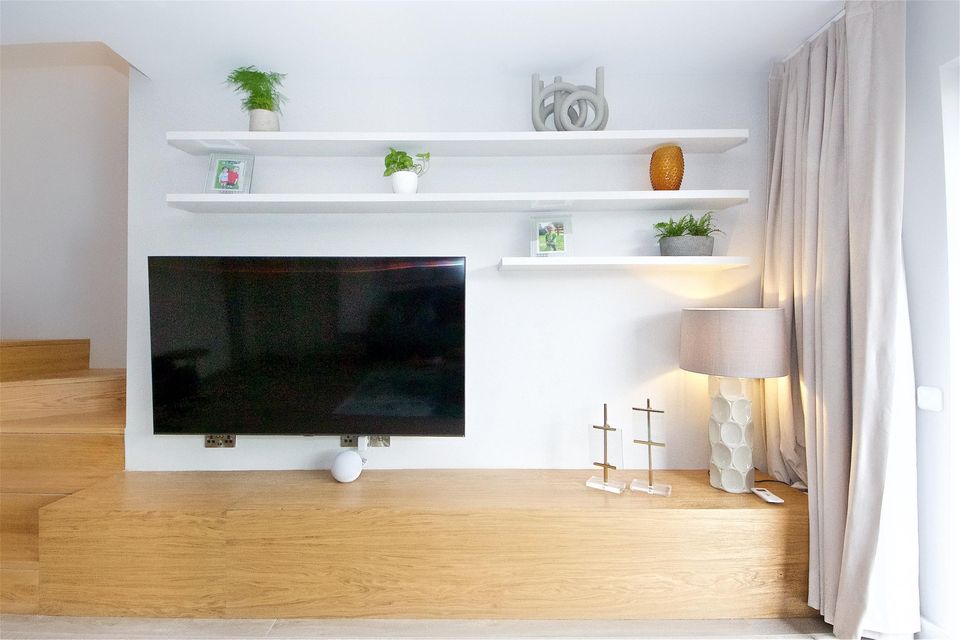 The 65" TV in Adams' hang out space.
