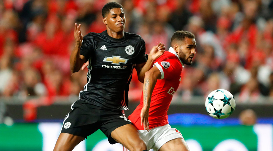 Benfica’s Douglas battles for the ball with Manchester United's Marcus Rashford. Photo: Reuters/Carl Recine/Reuters