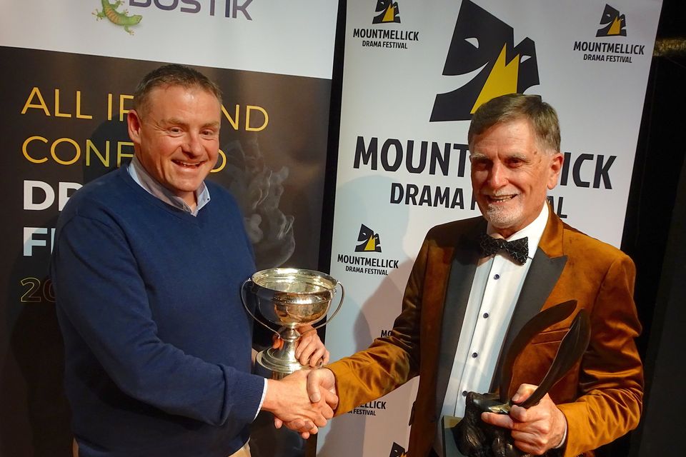 Niall McGrath being presented with Best Director Award by All Ireland Adjudicator Walker Ewart ADA at the Finals in Mountmellick.