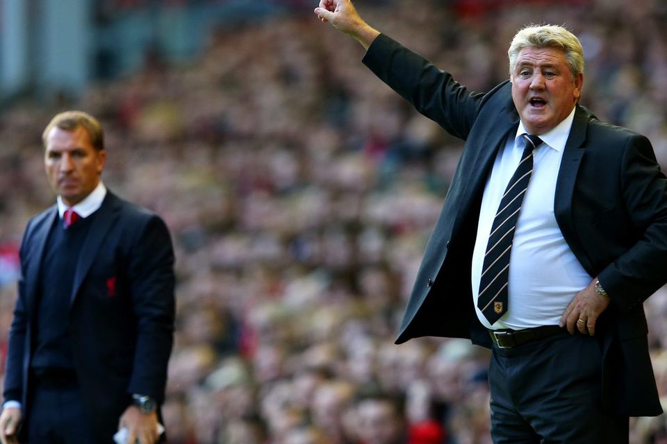 Hull City manager Steve Bruce gestures next to Liverpool manager Brendan Rodgers. Alex Livesey/Getty Images
