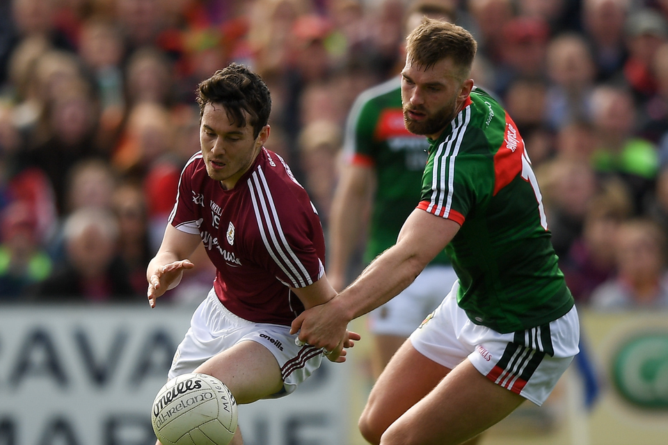 13 May 2018; Ian Burke of Galway in action against Aidan O'Shea of Mayo during the Connacht GAA Football Senior Championship Quarter-Final match between Mayo and Galway at Elvery's MacHale Park in Mayo. Photo by Eóin Noonan/Sportsfile