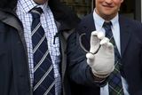 thumbnail: David Taylor (left) with his brother in-law Andrew Coulter, from Kircubbin, Co Down, with the rare Viking silver ring he discovered on his brother in-law's farm, outside a special treasure trove inquest hearing at Belfast coroner's court.