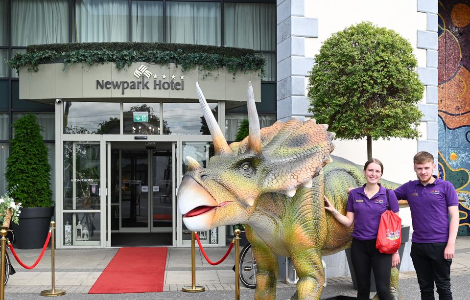 Cliona Dunne and Jack Nolan pictured with a newly arrived Triceratops at Newpark Hotel