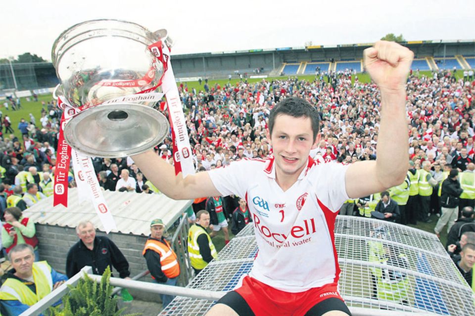 Tyrone captain Ronan McNabb holds up the Tom Markham Cup after his side defeated Mayo 1-20 to 1-15 in the replayed All-Ireland minor final at Pearse Park, Longford yesterday