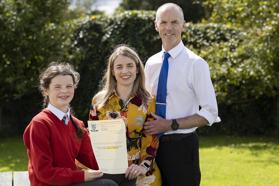 Cara Darmody Ardfinnan Co Tipperary who recieved an 01/97% Distinction in ordinary level maths in the leaving Certificate with her parents Mark and Noelle Darmody, photo john d kelly