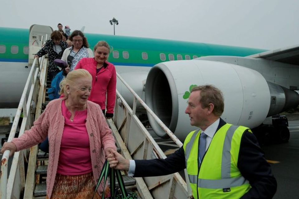 09/08/2015 An Taoiseach Enda Kenny welcoming passengers on the Aer Lingus flight carrying pilgrims from New York to Knock Shrine landing in Ireland West Airort Knock. Photo : Keith Heneghan / Phocus