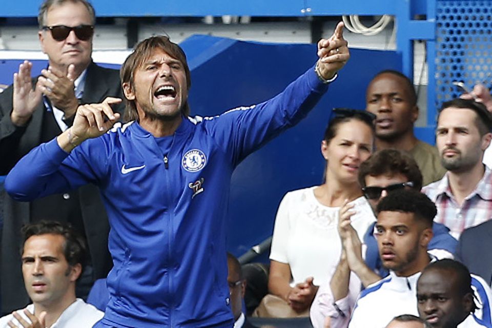 Chelsea's Italian head coach Antonio Conte gestures on the touchline during the English Premier League football match between Chelsea and Burnley at Stamford Bridge in London on August 12, 2017. Burnley won the game 3-2. / AFP PHOTO / Ian KINGTON /Getty Image