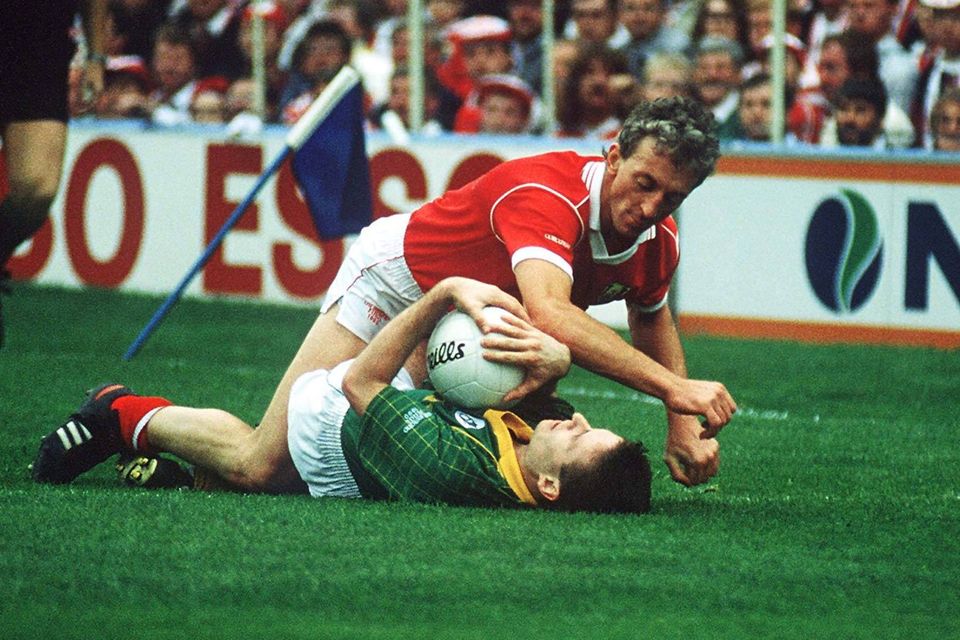 TAKE THAT: Conor Counihan of Cork and Meath’s Bernard Flynn get up close and personal in the 1990 All-Ireland SFC final. Photo: Ray McManus / Sportsfile