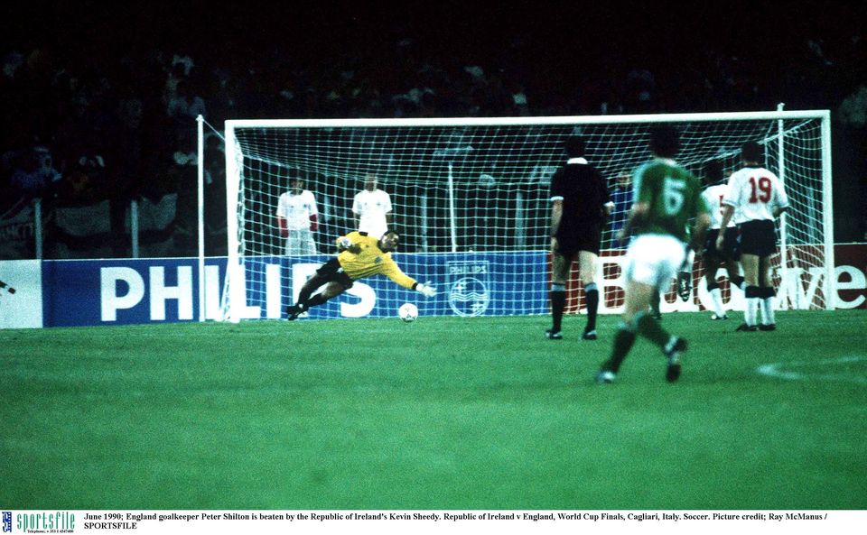 June 1990; England goalkeeper Peter Shilton is beaten by the Republic of Ireland's Kevin Sheedy. Republic of Ireland v England, World Cup Finals, Cagliari, Italy. Soccer. Picture credit; Ray McManus / SPORTSFILE