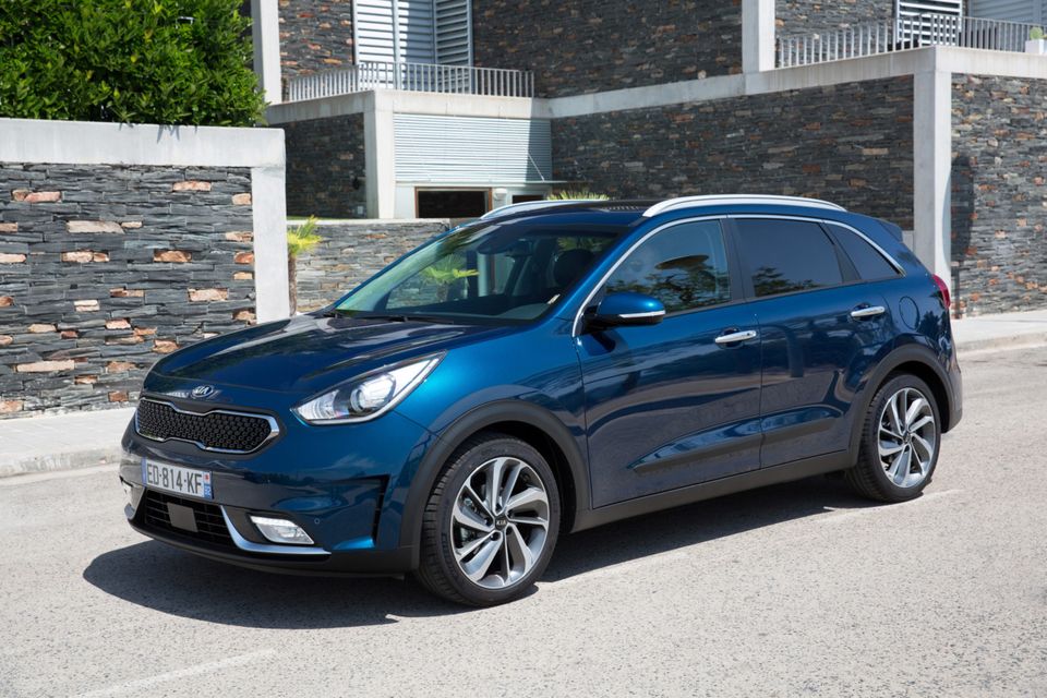 FRUGAL: Niro hybrid, left, is the first for Kia in the eco-friendly range