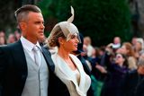 thumbnail: Robbie Williams and Ayda Field arrive ahead of the wedding of Princess Eugenie to Jack Brooksbank at St George's Chapel in Windsor Castle