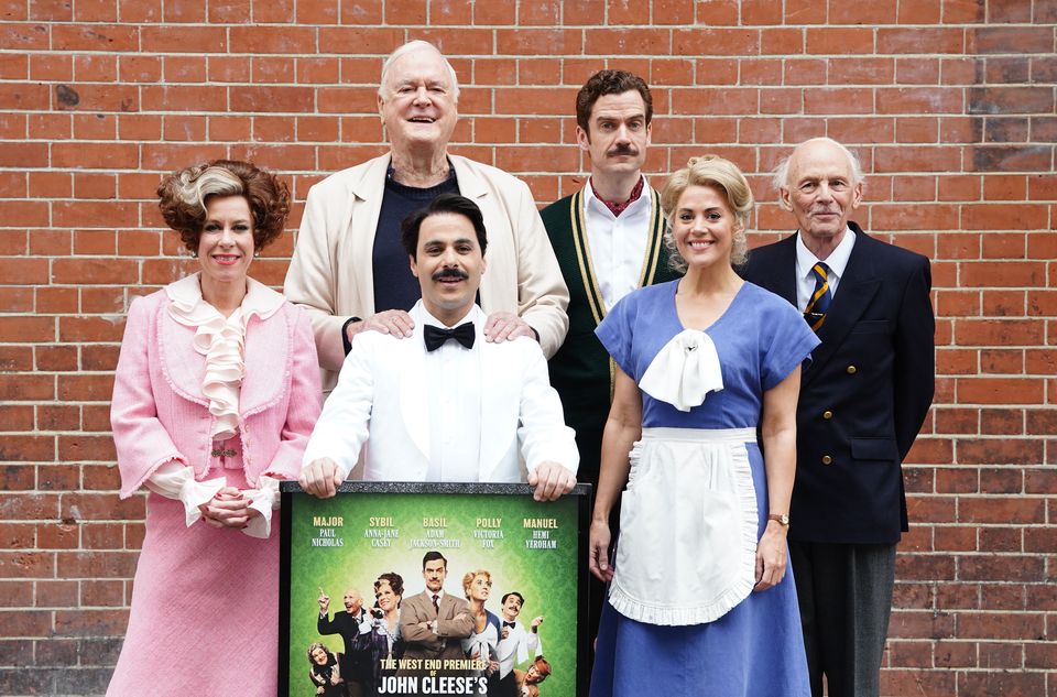 John Cleese with the cast of the Fawlty Towers The Play (Ian West/PA)