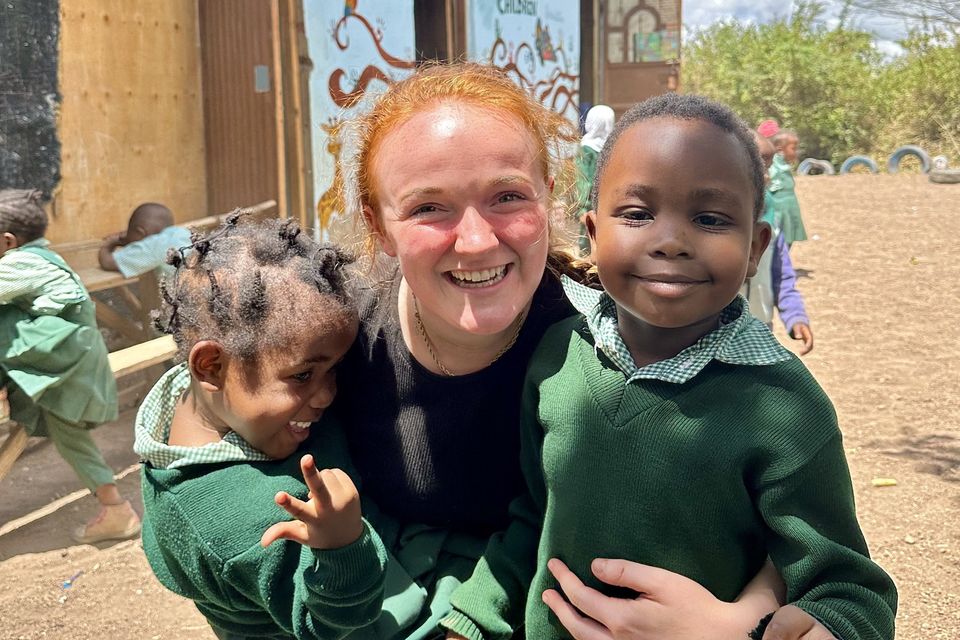 Cliona with pupils during a previous visit to Tanzania. 